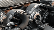 Close-up of PTG 1000 M177.2 Turbo System installed in engine bay by TunerGenix