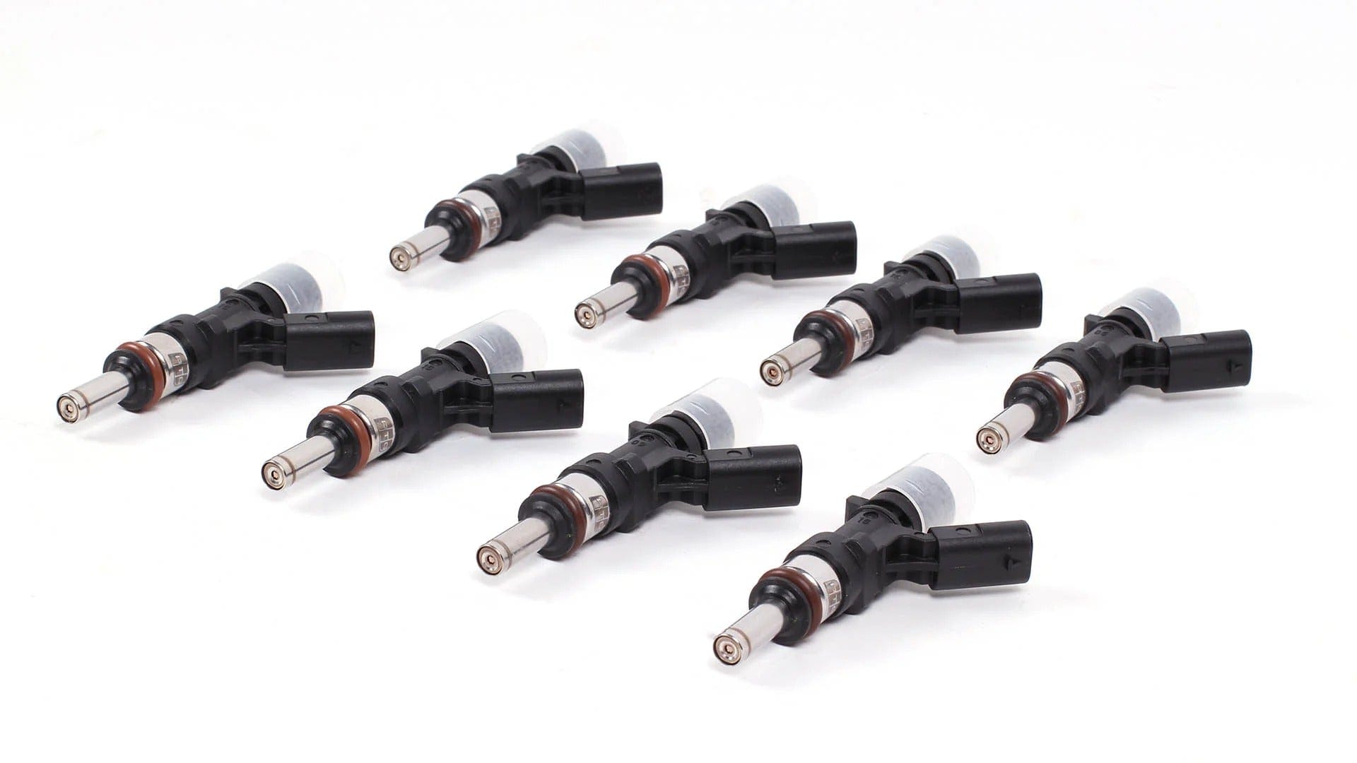 Set of eight Premier Tuning Group M156 fuel injectors with black connectors and metal tips