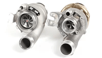 TunerGenix PTG 1000 M177.2 Turbo System showing twin turbochargers with metallic finish and inlet pipes