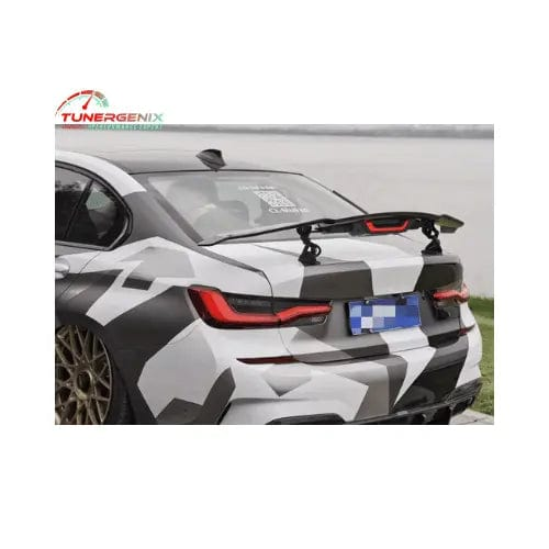 TunerGenix electric carbon fiber rear spoiler on a stylish car for enhanced aerodynamics